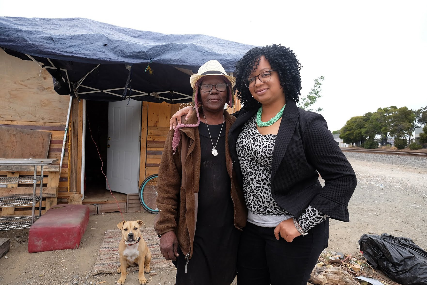 Candice Elder with Ms. Elizabeth outside her tiny home